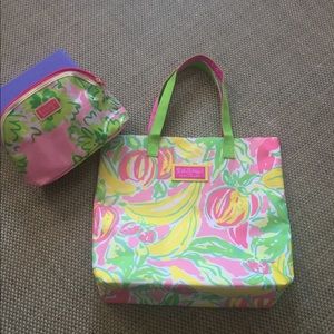 Brand new EL canvas tote with cosmetic bag set.